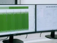 Qi: nok9 test software displayed on desktop monitors